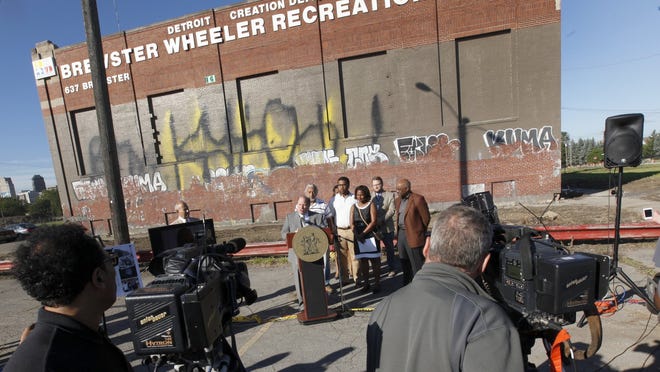 Detroit Mayor Mike Duggan talks to the media about the City of Detroit seeking proposals to redevelop the historic but vacant Brewster Wheeler recreation center on Thursday, Aug. 28, 2014.