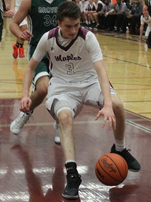 Senior point guard Liam Neel (3) provides  Seaholm with experience and depth this year.