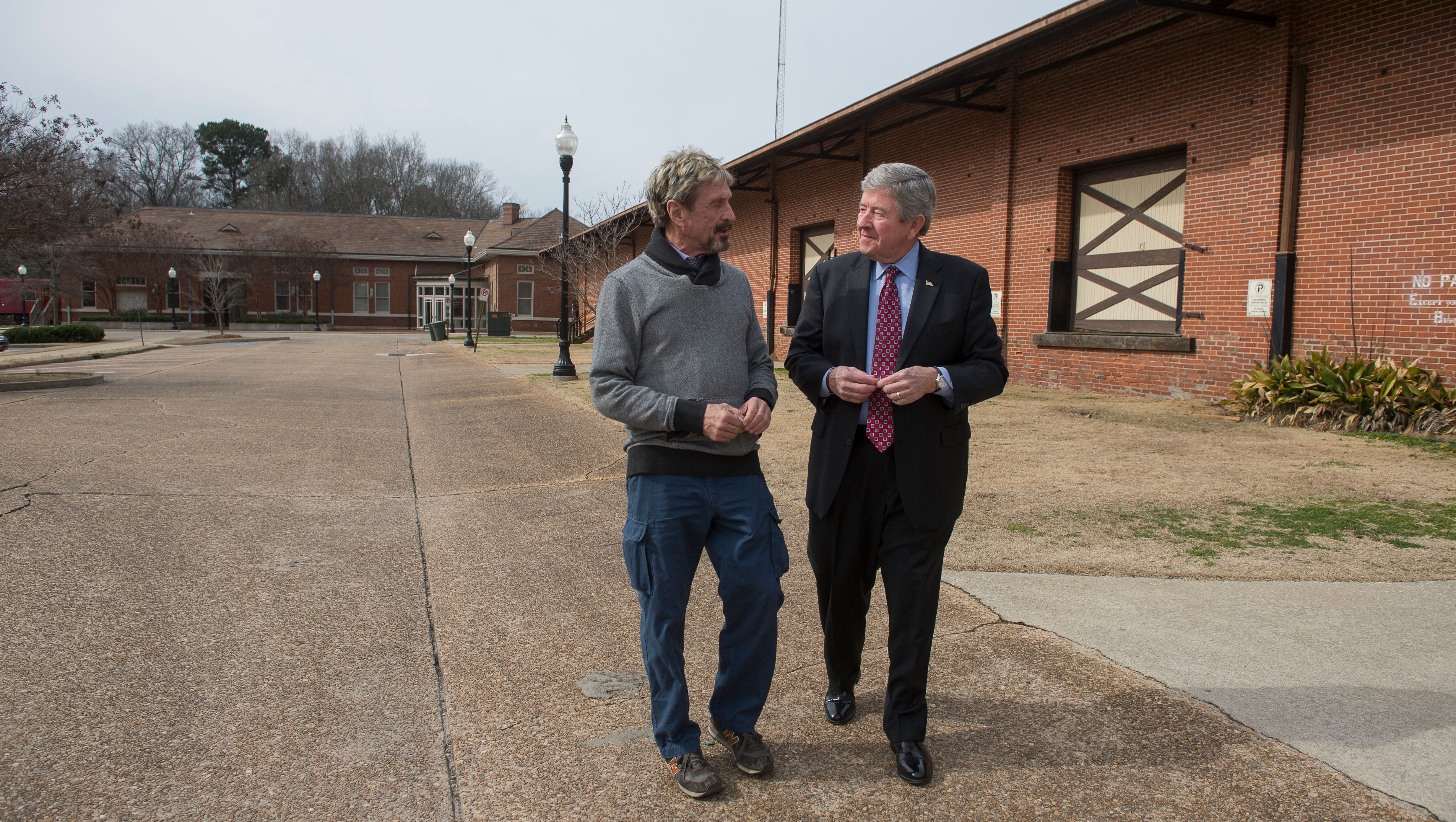 John McAfee, left, talks with Opelika Mayor Gary Fuller.