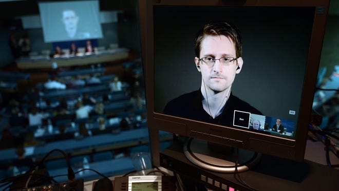 Edward Snowden speaks from Russia to the Council of Europe in Strasbourg, France, in 2015.