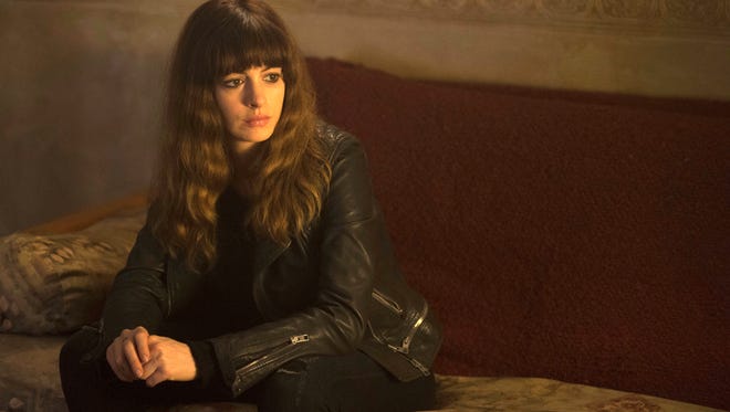 Anne Hathaway discovers the monster within has escaped, literally, in the monster-movie comedy "Colossal."
