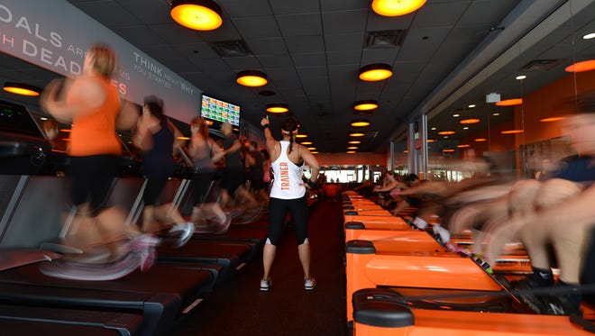 Exercisers in action at Orangetheory.