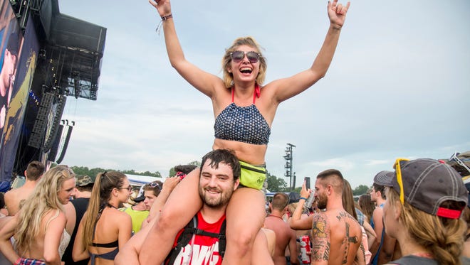 Festival goers attend the Faster Horses Music Festival in the Brooklyn Trails Campground at Michigan International Speedway on Friday, July 21, 2017, in Brooklyn, Mich. (Photo by Amy Harris/Invision/AP)