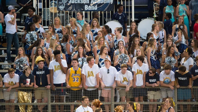 Jackson Academy fans celebrate during the start of the game Friday against Northeast Lauderdale.