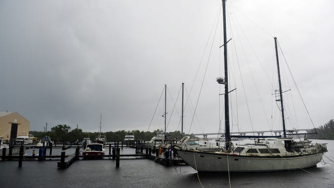Greg Von Zielinski decided he would rather tie his 54-foot sailboat (right) to the dock at the Vero Beach Municipal Marina on Saturday, Sept. 9, 2017, and wait out Hurricane Irma as it passes over the Treasure Coast.