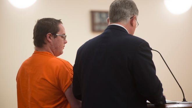 Andrew Vanderwal appears in court with his attorney during a hearing at Larimer County Justice Center on Tuesday, May 22, 2018. 