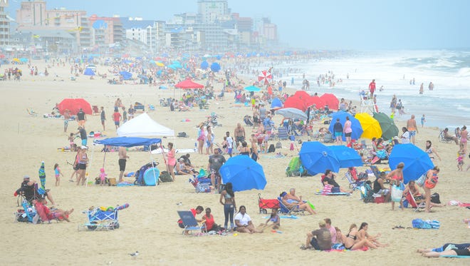 Umbrellas line the beach in Ocean City, Md. on Monday, July 23, 2018.