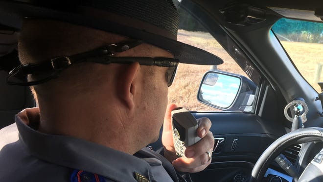 In this November 2016 file photo, Master Sgt. Criss Turnipseed of MHP's Starkville district mans I-55 in Madison County to increase visibility and deter distracted driving during the holidays.
State Rep. Tom Miles has introduced a bill in the Legislature that would raise MHP trooper pay and get more troopers on the state's roads.
