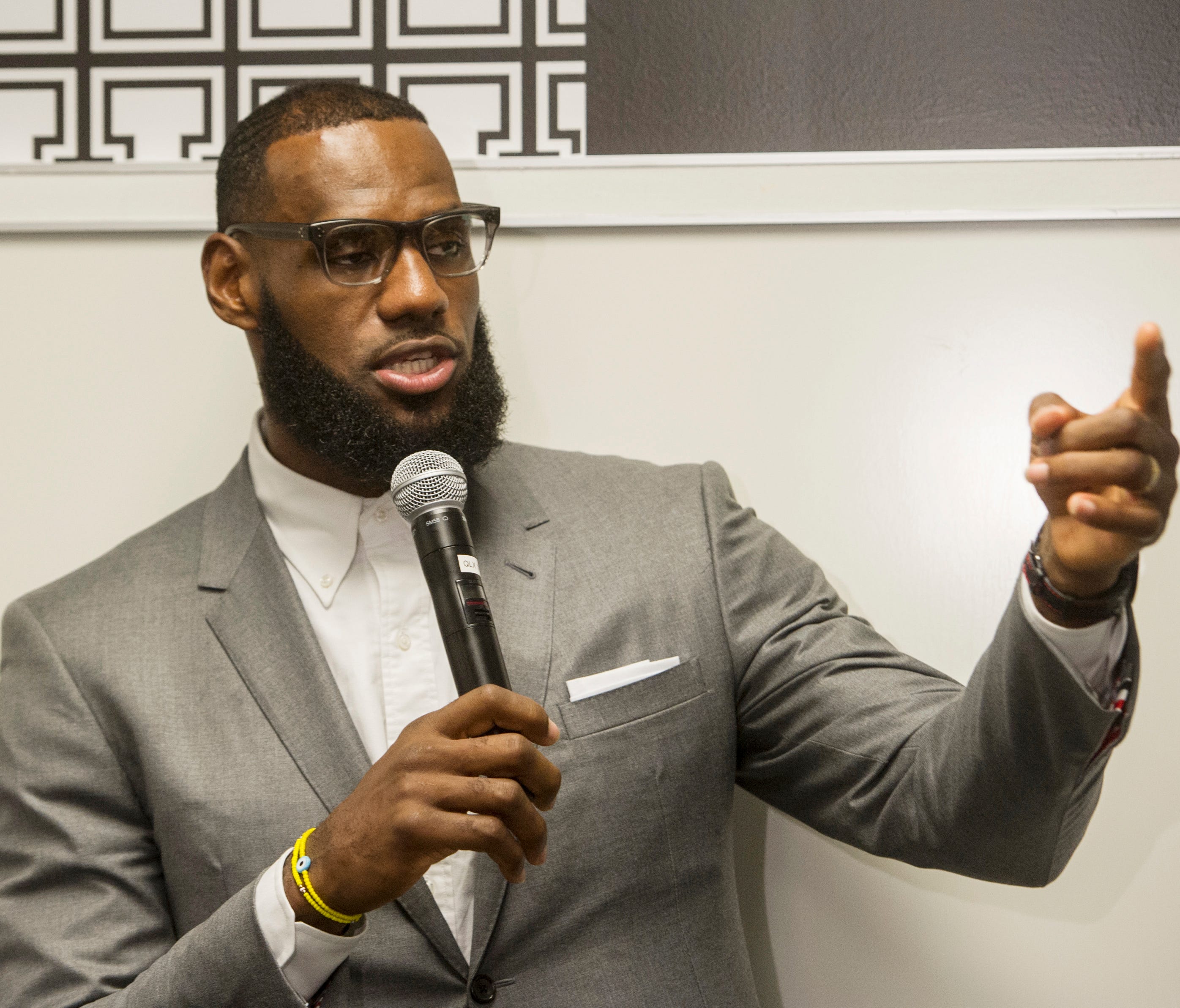 LeBron James speaks at a news conference after the opening ceremony for the I Promise School in Akron, Ohio.