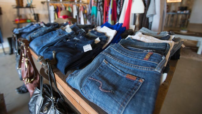 Denim at Refinery Resale, a new consignment shop that sells high end products and feels very much like a boutique, Indianapolis, Friday, August 8, 2014.
