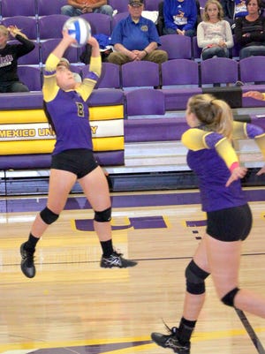 Western's Shannon Rich prepares to jump and spike the ball after being set during action this past year at home. Rich finished her career with 827 kills.