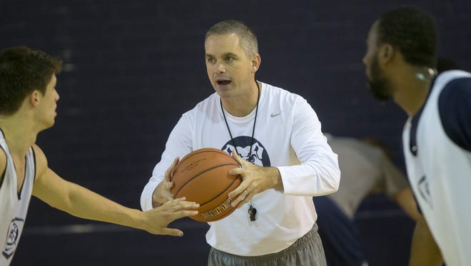 Chris Holtmann, interim Head Coach of the Butler Men's Basketball team, works his team through practice, Indianapolis, Sunday, October 12, 2014. 