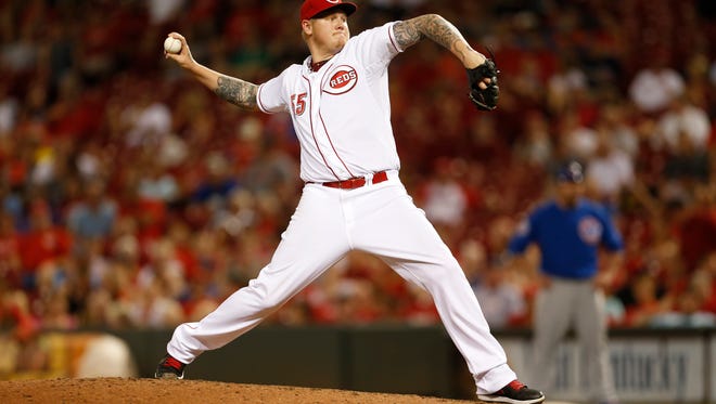 Mat Latos pitches against the Chicago Cubs on Aug. 27.