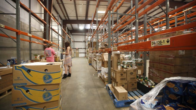 Joe Rondone/Democrat
 Food is organized in the new warehouse  of  Second Harvest of the Big Bend, where CEO Jim Croteau says there is room for millions more pounds of food than the previous location.
Joe Rondone/Democrat
Food supplies are organized in the new warehouse and location of the Second Harvest of the Big Bend on Tuesday where CEO Jim Croteau says there is room for millions more pounds of food than the previous location. Food supplies are organized in the new warehouse and location of the Second Harvest of the Big Bend on Tuesday where CEO Jim Croteau says there is room for millions more pounds of food than the previous location.