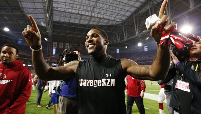 Arizona Cardinals' Patrick Peterson celebrates the win over the Green Bay Packers on Dec. 27, 2015 in Glendale, Ariz.