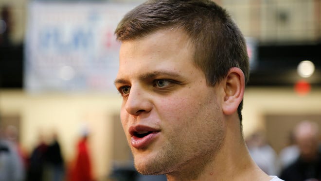 Cincinnati Reds catcher Devin Mesoraco talks with media after a press conference at the P&G Cincinnati MLB Urban Youth Academy in Cincinnati on Wednesday, Jan. 27, 2016. The Reds and MLB announced Wednesday that the 2016 and 2017 RBI World Series youth baseball and softball event will take place in Cincinnati, including games played at Great American Ballpark. 