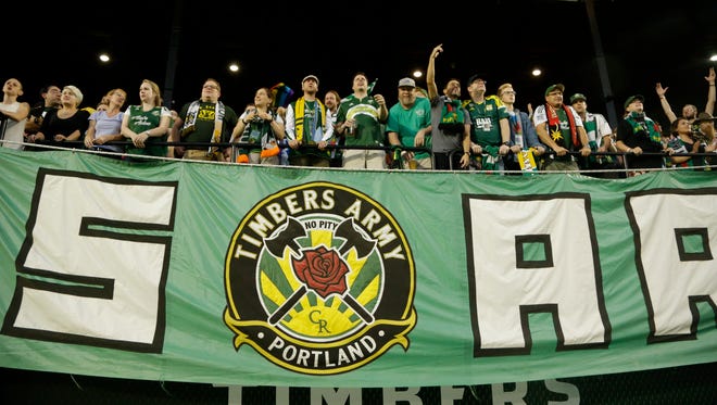 Portland Timbers fans are shown during their MLS soccer match against Sporting Kansas City  in Portland, Ore., Wednesday, Sept. 9, 2015. (AP Photo/Don Ryan)