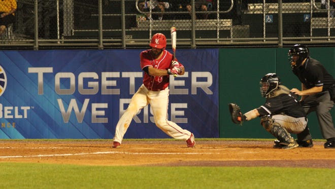UL catcher Nick Thurman takes a swing Wednesday against Arkansas State in the Sun Belt tournament.