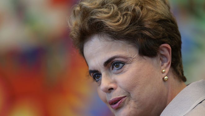 Brazilian President Dilma Rousseff speaks during a press conference at the Alvorada residential palace, in Brasilia, Brazil, on June 14, 2016. Brazil's Senate voted to put Rousseff on trial for allegedly breaking fiscal rules in her managing of the federal budget.