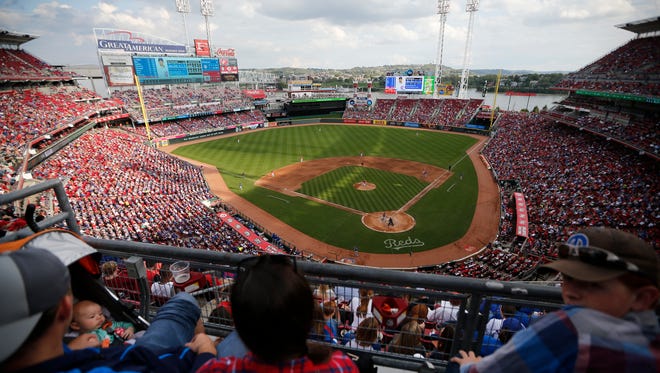 A crowd of 32,587 watches the sixth inning of the MLB National League regular-season finale game between the Cincinnati Reds and the Chicago Cubs at Great American Ball Park in downtown Cincinnati on Sunday, Oct. 2, 2016. The Reds gave up a lead in the top of the ninth to lose 7-4 to the Cubs.