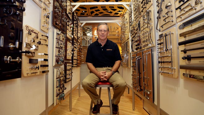 In this Friday, Oct. 21, 2016, photo, Ken Wertz, president of Wilkinson Supply, poses for a picture in the company's showroom that sells kitchen, bathroom, plumbing and decorative items, in Raleigh, N.C. Small businesses such as Wilkinson's Supply are preparing for an impending change in overtime.