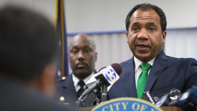 Mayor Dennis Williams
speaks at a press conference.