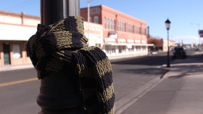 Scarfs and jackets can be seen tied to poles and trees throughout the city but not for fashion or to warm the posts. Deming MainStreet Program has joined a nation-wide effort to help the homeless by tying scarfs and jackets around cities for anyone who might need an extra layer of warmth this winter.