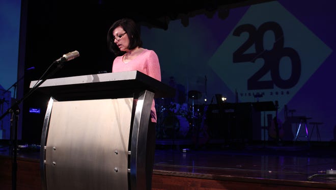 Richland County Commissioner Marilyn John reads from the last book of the Bible at Crossroads Community Church on Wednesday, March 1, 2017. John was the final reader in an around-the-clock Bible reading before the church announced it met its fundraising goal for its giving campaign, titled Vision 2020.