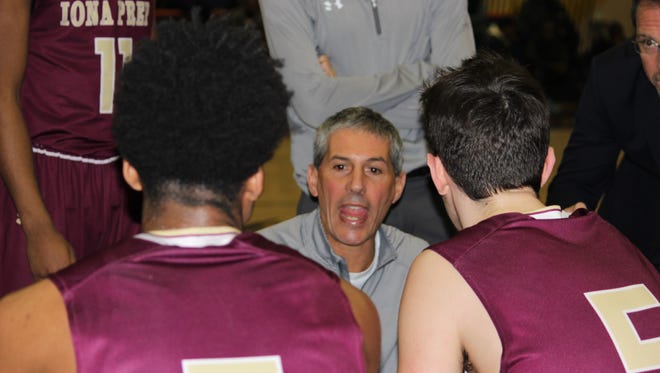 Vic Quirolo talks to his team during Iona Prep's 52-46 win over Scanlan at St. Raymond on March 2, 2017.