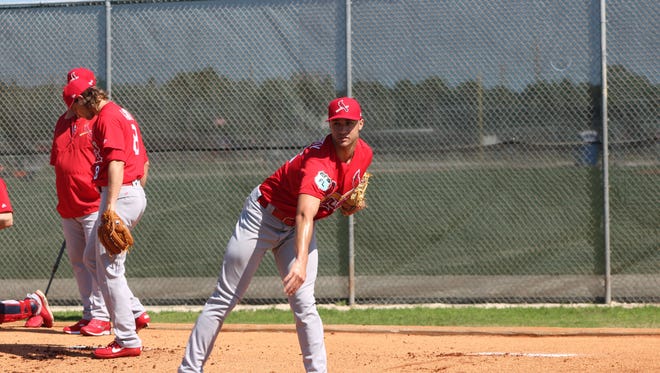 Jack Flaherty throws a bullpen session during spring training camp.
