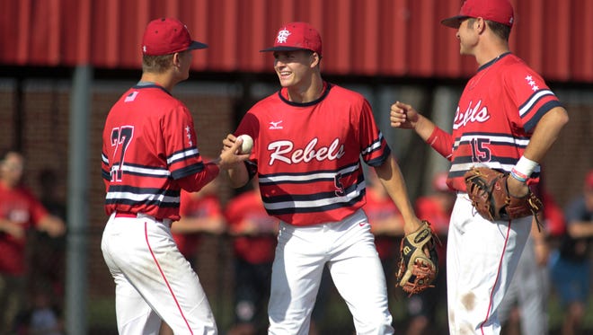 Teurlings Catholic's Hayden Cantrelle talks with teammates during an April 12 game against St. Thomas More in Lafayette. Cantrelle was named Class 4A All-State Outstanding Player for baseball.