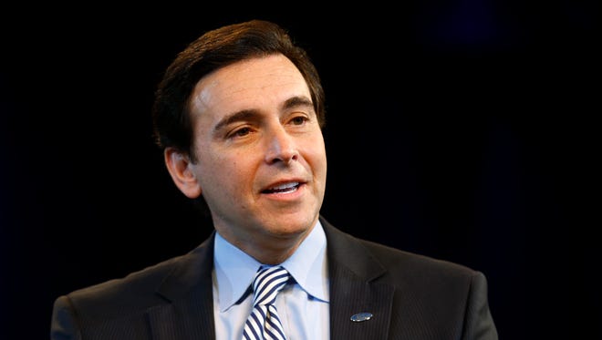 Ford Motor Company Chief Operating Officer Mark Fields speaking in a news conference on May 1, 2014, in Dearborn, Mich.