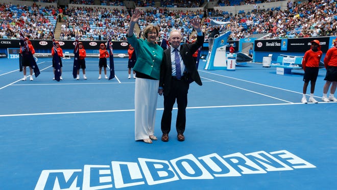 In this Jan. 26, 2015 photo, Australian tennis greats Margaret Court, left, and Rod Laver wave during the official launch of the remodeled Margaret Court Arena at the Australian Open tennis championship in Melbourne.