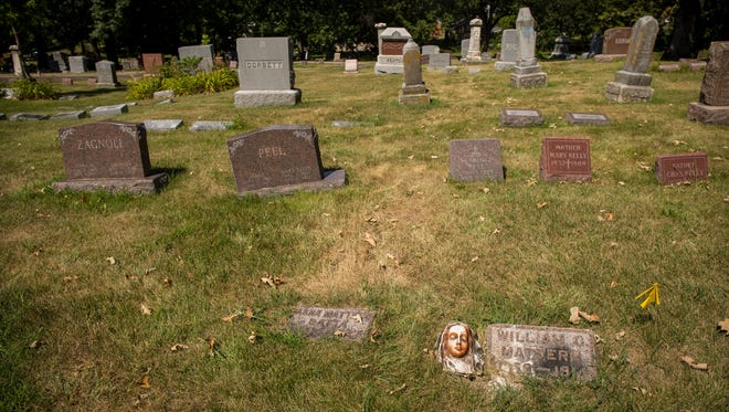 Anthony Garza near the suspected unmarked grave of George Mattern at Woodland Cemetery, 2019 Woodland Ave., Des Moines, Tuesday, Aug 8, 2017.