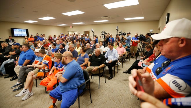 FC Cincinnati supporters fill the chambers during a County Commissioners meeting at the Hamilton County Board of Elections in Norwood, Ohio, on Tuesday, Sept. 26, 2017. The Commissioners met to discuss the future of projects in the county, including a new soccer stadium, rebuild of US Bank Arena and repairs to the Western Hills Viaduct. 