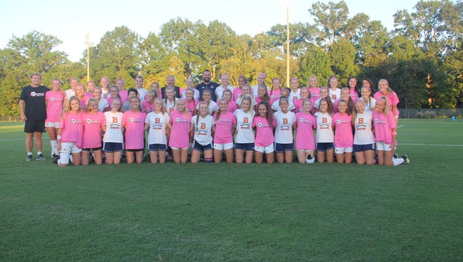Hendersonville High School and Beech High School girls soccer teams joined forces to kick cancer.