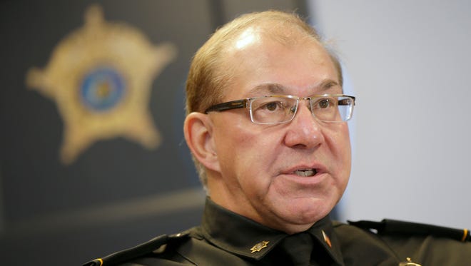 Acting Milwaukee County Sheriff Richard R. Schmidt warns against scammers.