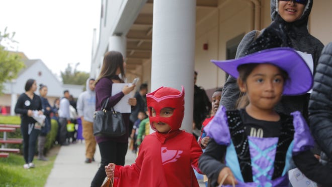 Students line up to on Halloween at Little Bear Creek Preschool.