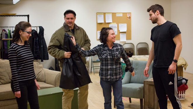 April Paul (left), Reese Madigan, Elizabeth Ledo and Mark Puchinsky rehearse a scene from "Russian Transport."