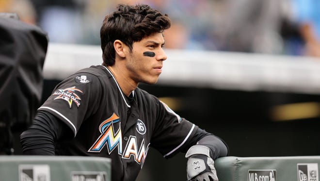Christian Yelich is in the third year of a seven-year, $49.57 million deal.