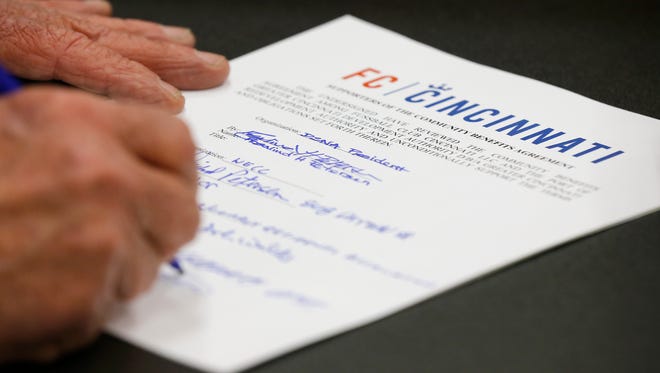 On April 16, stakeholders signed a community benefits agreement at City Hall regarding the FC Cincinnati soccer stadium in West End. City Council did not immediately recognize it, and negotiations have continued.