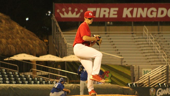 Jacob Patterson’s windup on the mound shows that the first year Palm Beach Cardinal can’t see a single one of the fans in the stands until the ball leaves his hand.