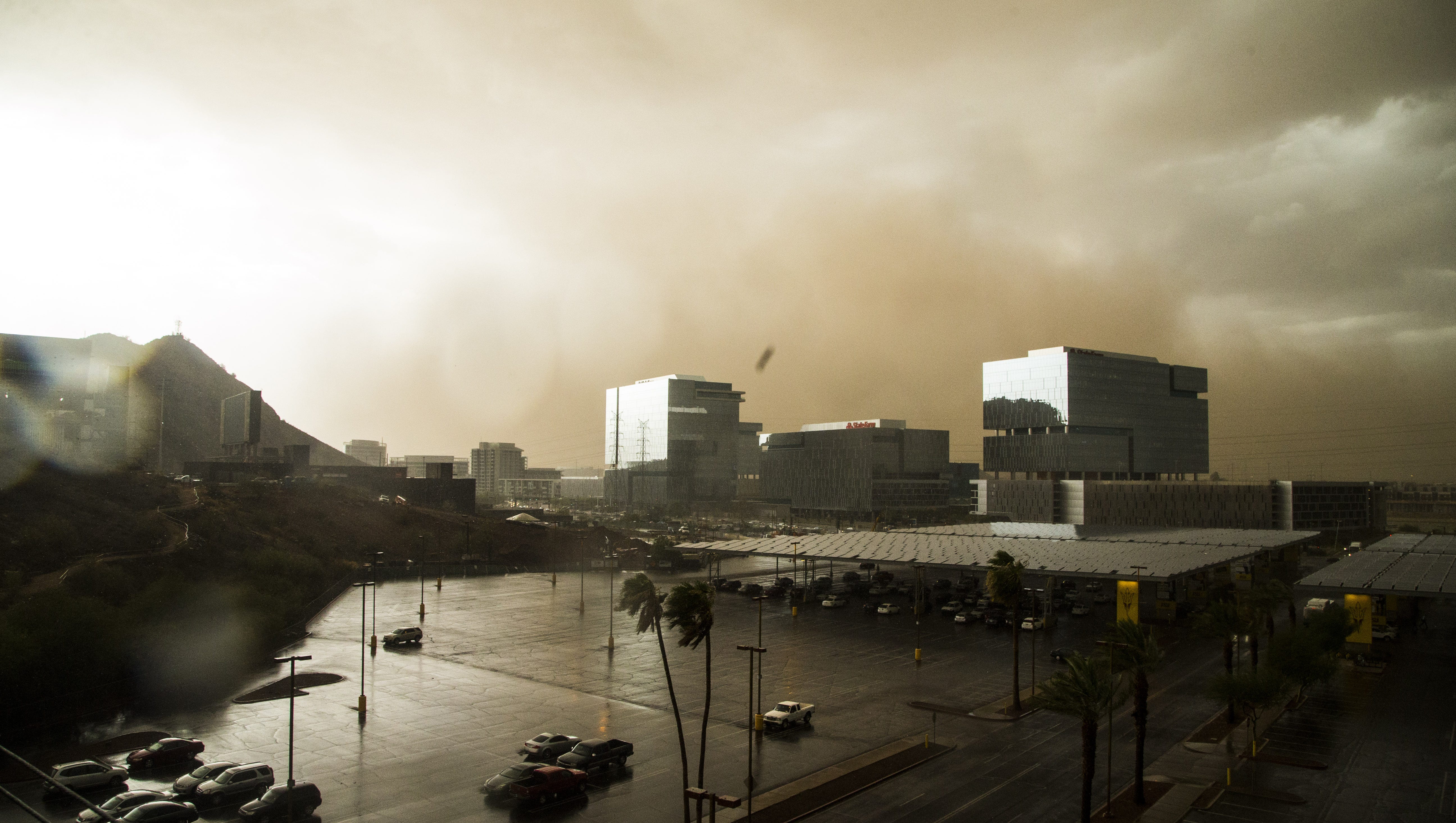 A dust storm passes the north side of Tempe, Ariz. on July 9, 2018.