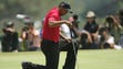 Tiger Woods reacts to missing his birdie putt on the