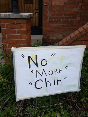 A sign was posted in a Southport neighborhood this week that denigrated Burmese refugees.