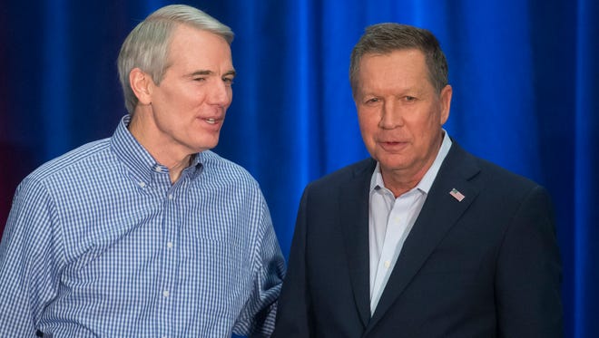 Sen. Rob Portman and Ohio Gov. John Kasich, shown in this March 2016 file photo, both said they have "concerns" about the Senate health care bill's Medicaid phaseout. (AP Photo/John Minchillo)