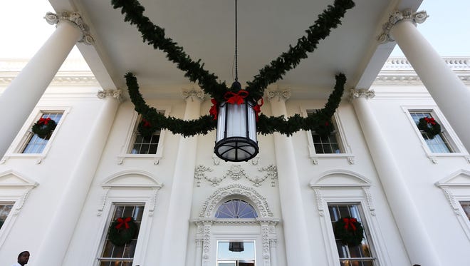 Christmas decorations are seen at the North Portico of the White House in Washington, Nov. 27, 2017.