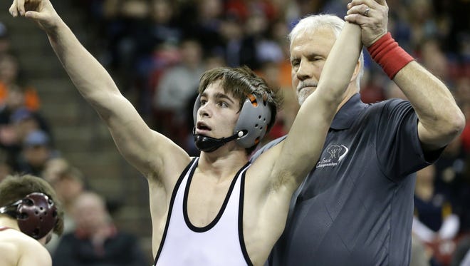Stratford High SchoolÕs A.J. Schoenfuss points to the crowd after his victory over Fennimore High SchoolÕs Riley Blair after their WIAA Division 3 120-pound State Final Match Saturday, Feb. 27, 2016, at the Kohl Center in Madison, Wis. 
Danny Damiani/USA TODAY NETWORK-Wisconsin