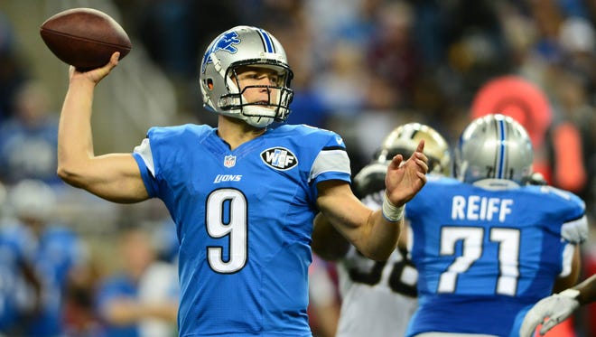 Detroit Lions quarterback Matthew Stafford (9) throws a pass during the fourth quarter against the New Orleans Saints at Ford Field.