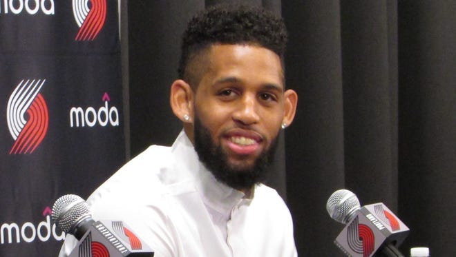 Portland Trail Blazers guard Allen Crabbe discusses his new contract with the team at a news conference at the team's practice facility in Tualatin, Ore., Friday, July 22, 2016. (AP Photo/Anne M. Peterson)